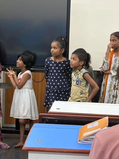 Children performing for their class